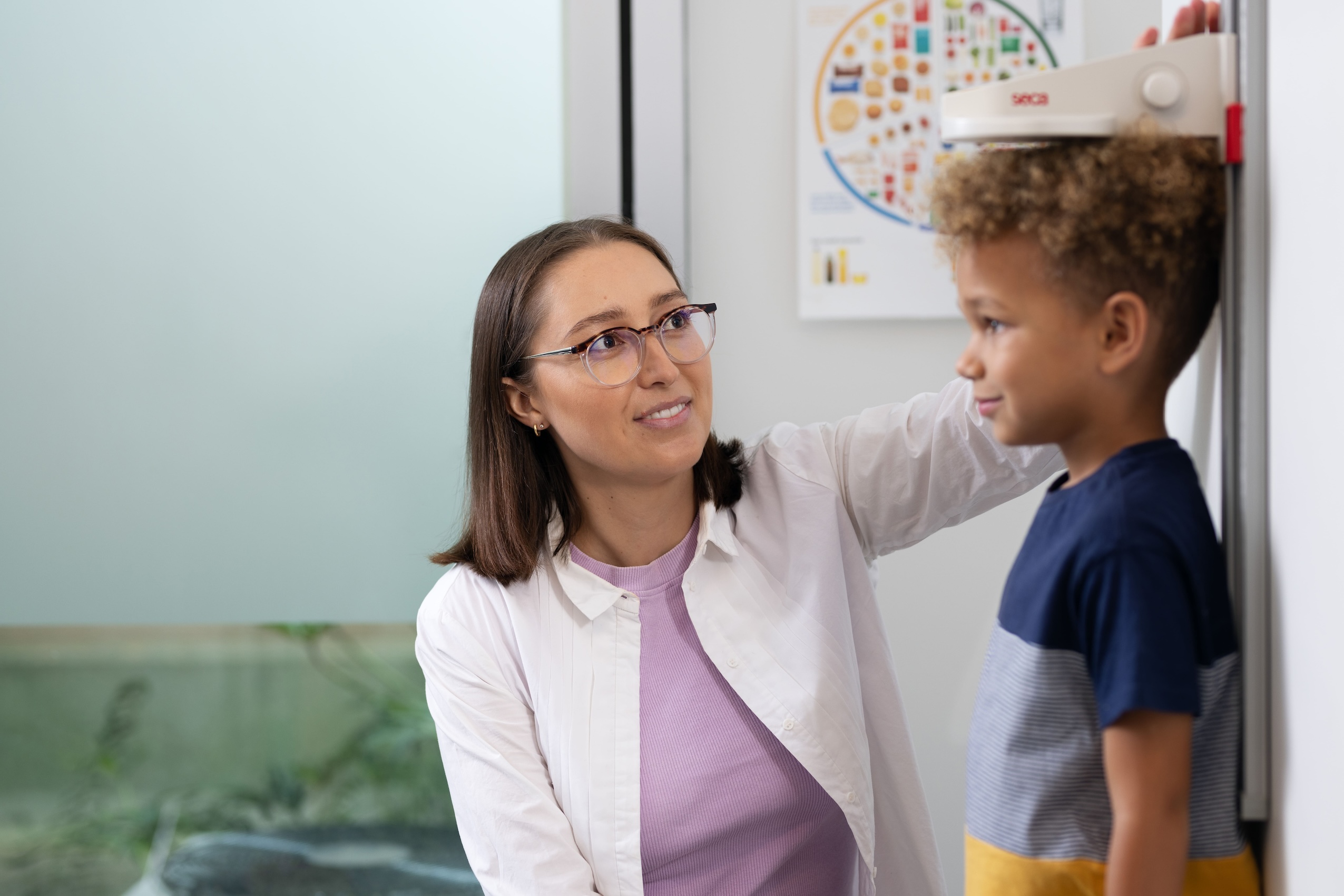 Health professional with kid
